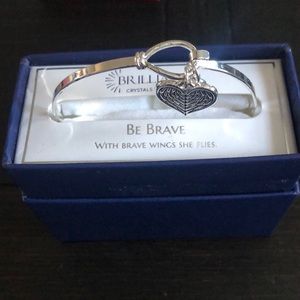 With brave wings she flies charm bracelet